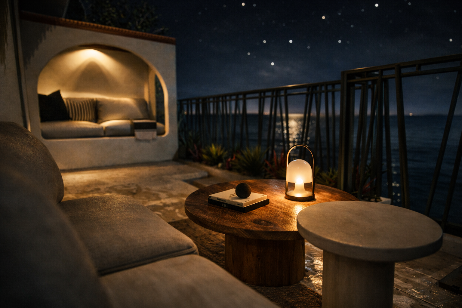 Terrasse de nuit avec alcôve éclairée, lanterne et vue sur l’océan sous un ciel étoilé, visualisation 3D.